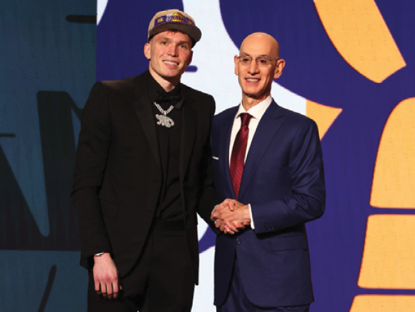 Dalton Knecht shakes hands with the NBA Commissioner.